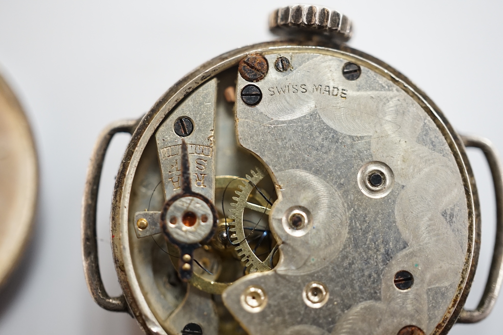 A gentleman's steel and gold plated Omega manual wind wrist watch, no strap, case diameter 35mm, together with a lady's silver wrist watch and a pocket watch. Condition - varies